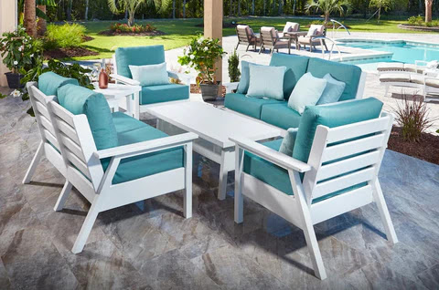 outdoor furniture with white wood and teal cushions