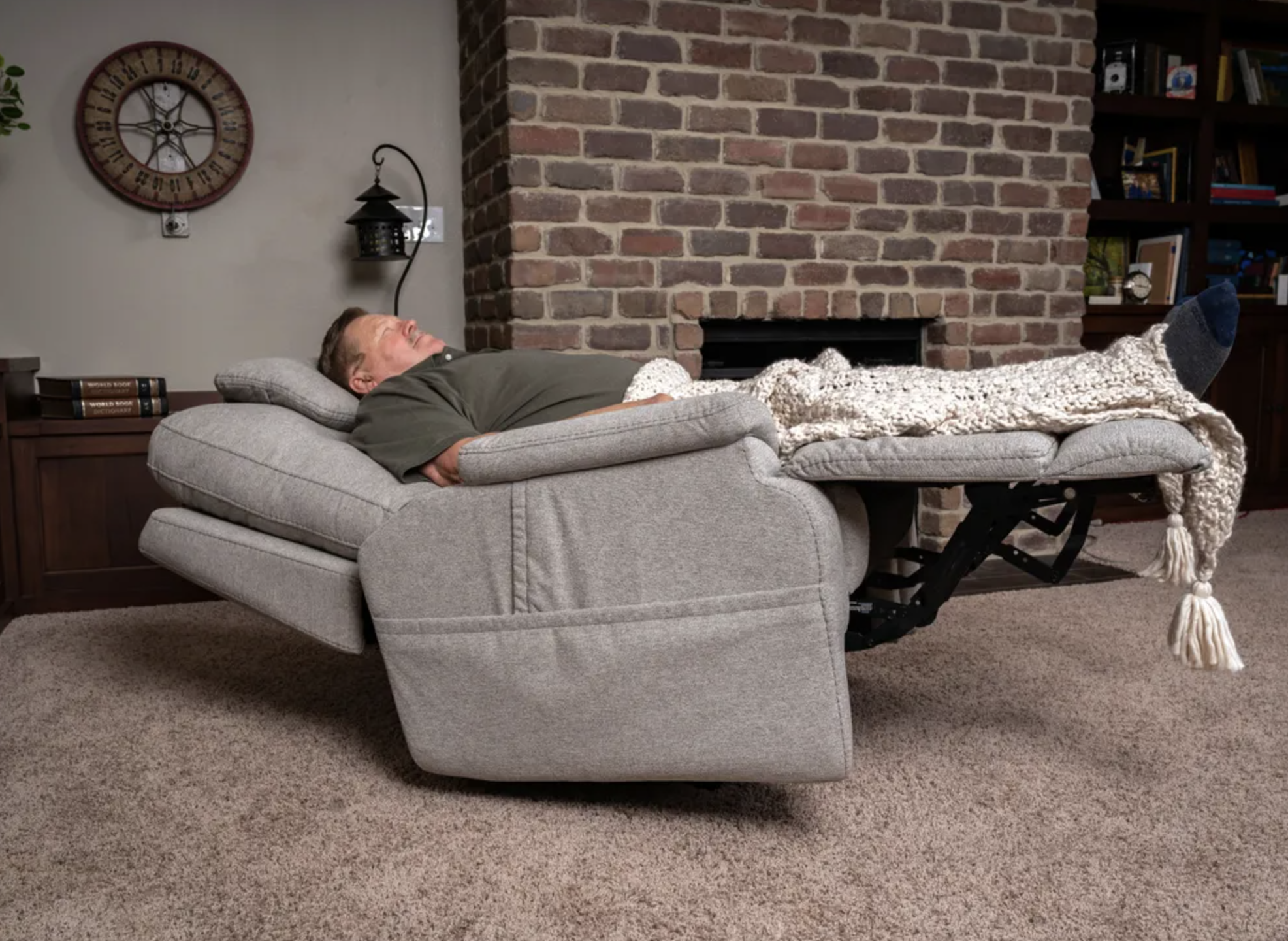 man sleeping in a recliner