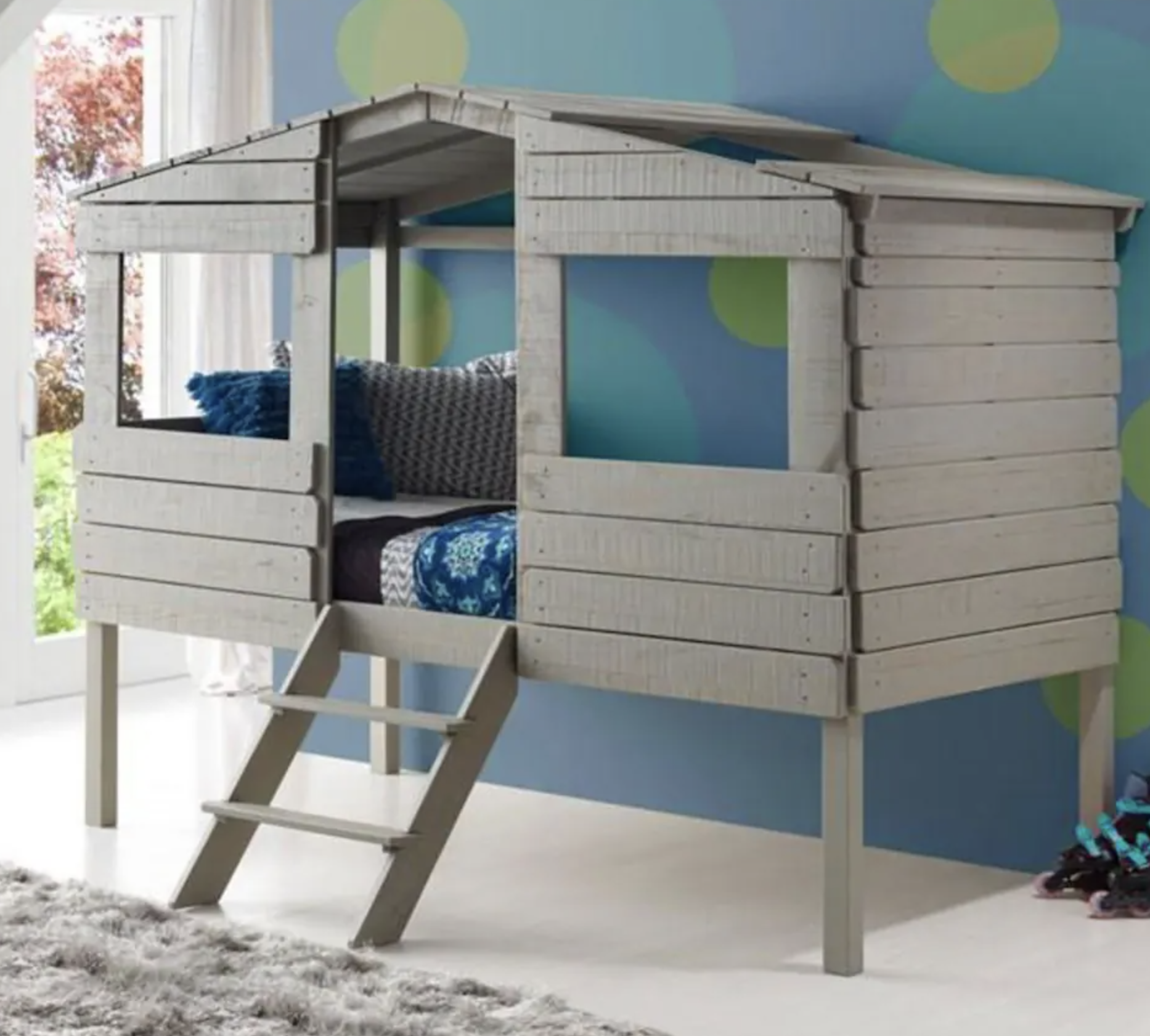 fort-style twin bed with ladder