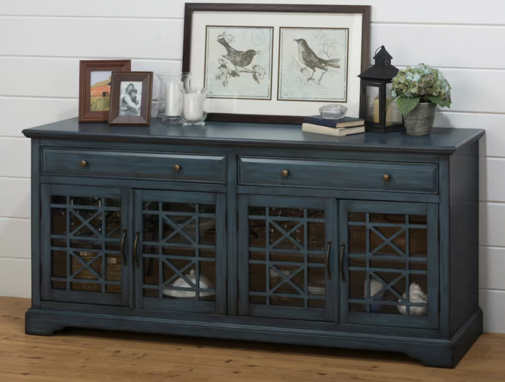 dark blue media console with glass display doors