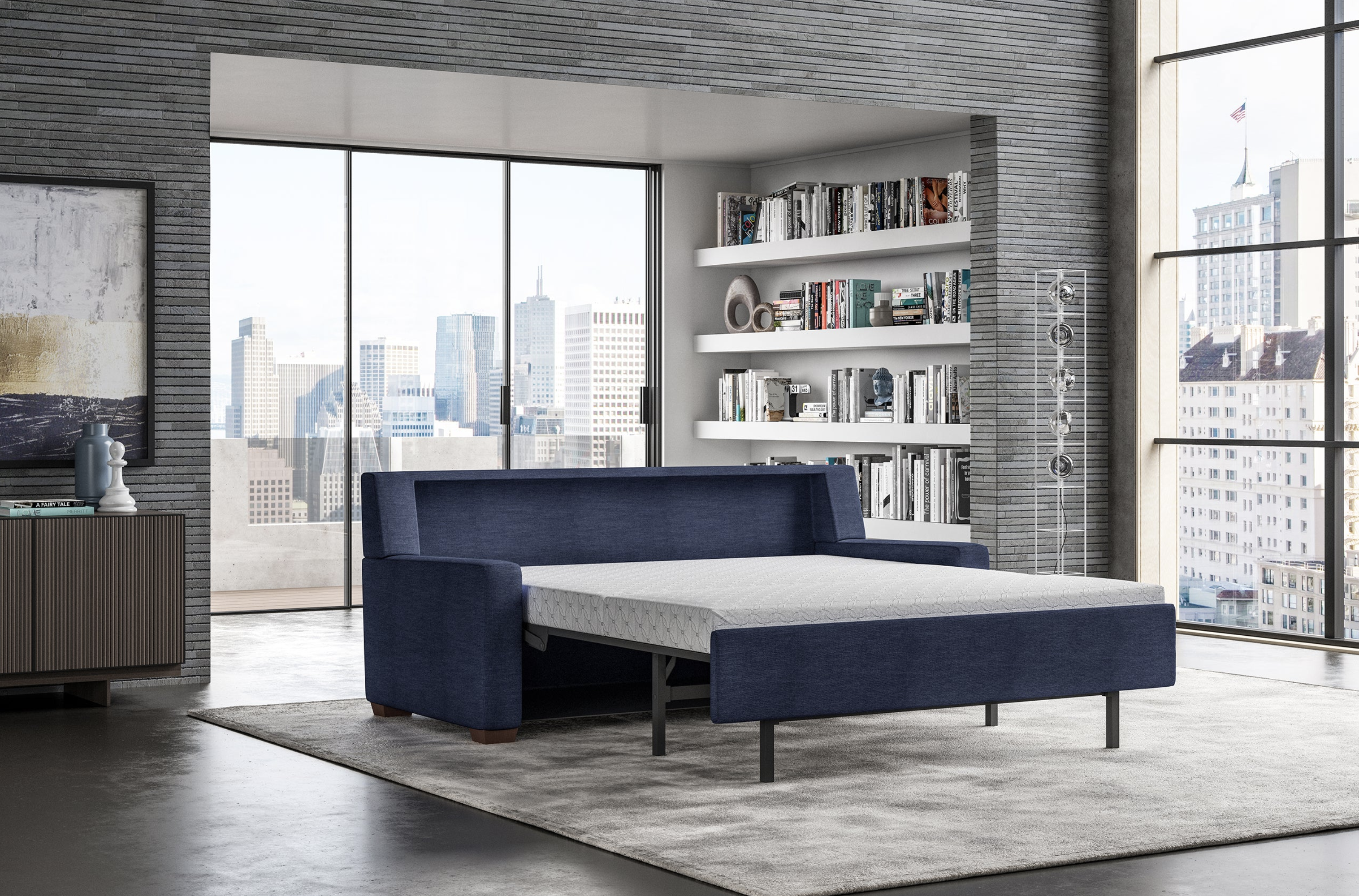 blue sleeper sofa with the bed extended out
