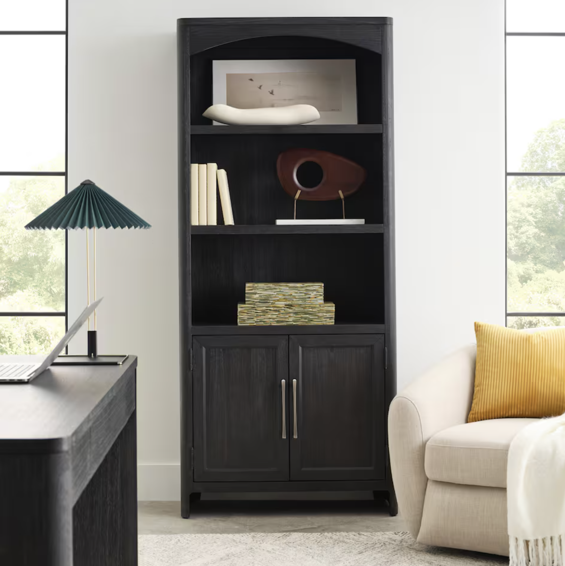 tall bookcase made of dark wood