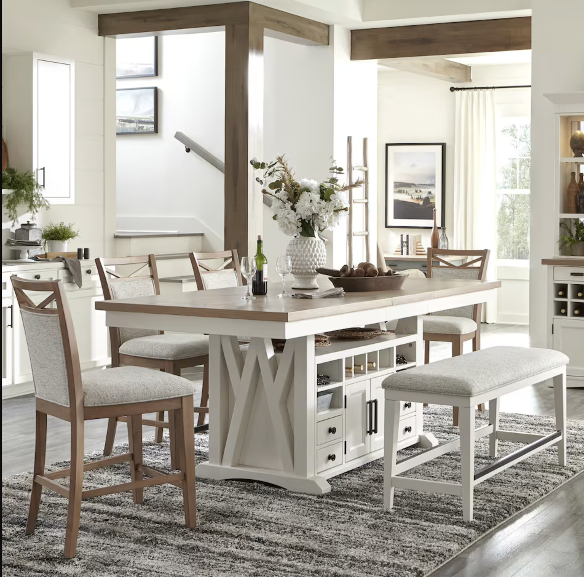 white dining table with dark top and bench