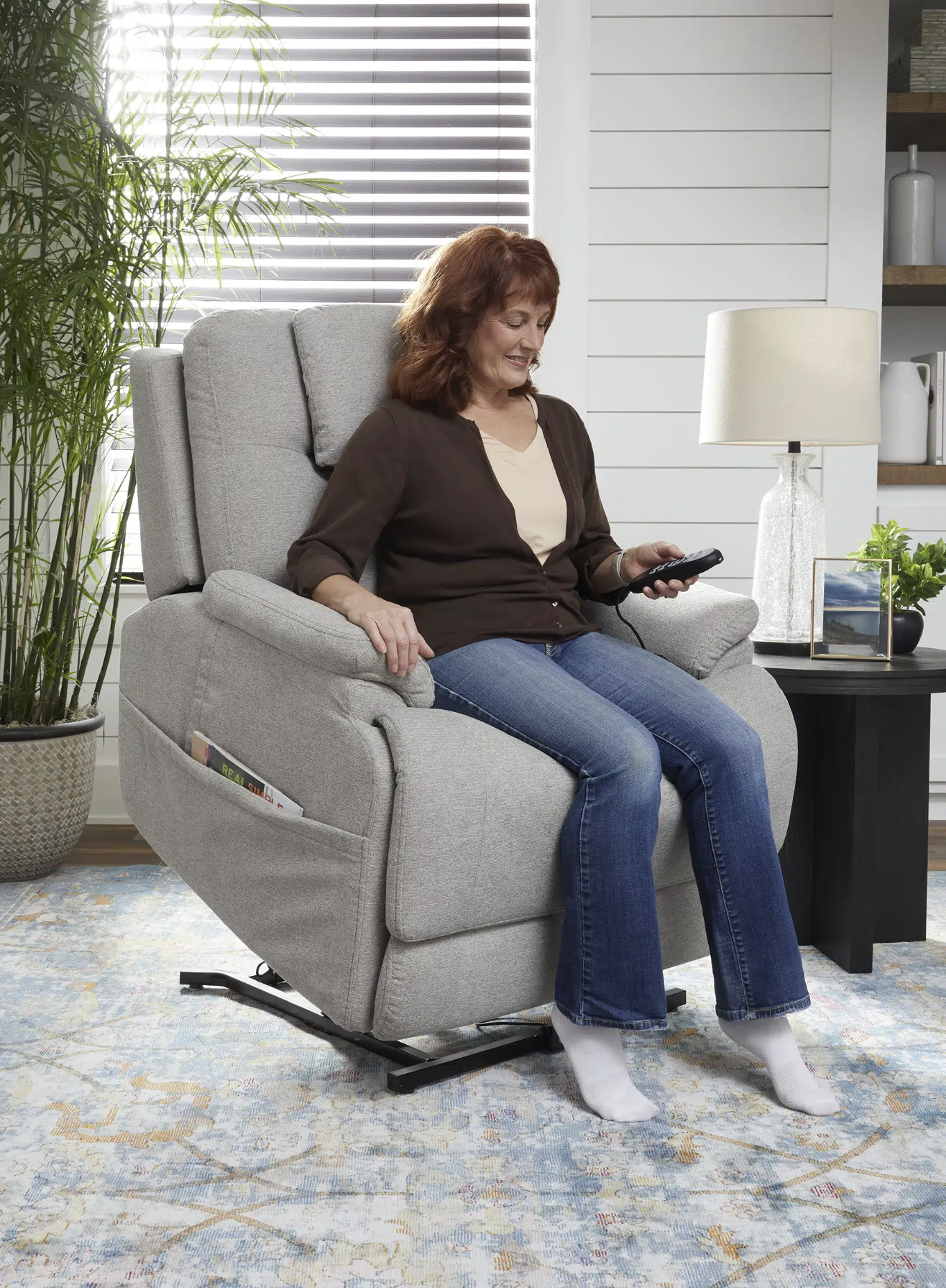 lift chair lifting a woman to standing position