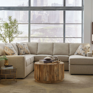modern designer sectional sofa with chaise and accent tables